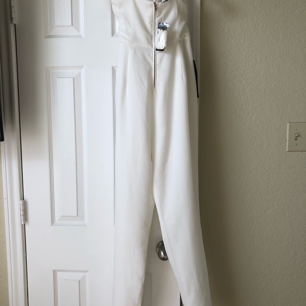 Bebe white romper ....great night out NWT